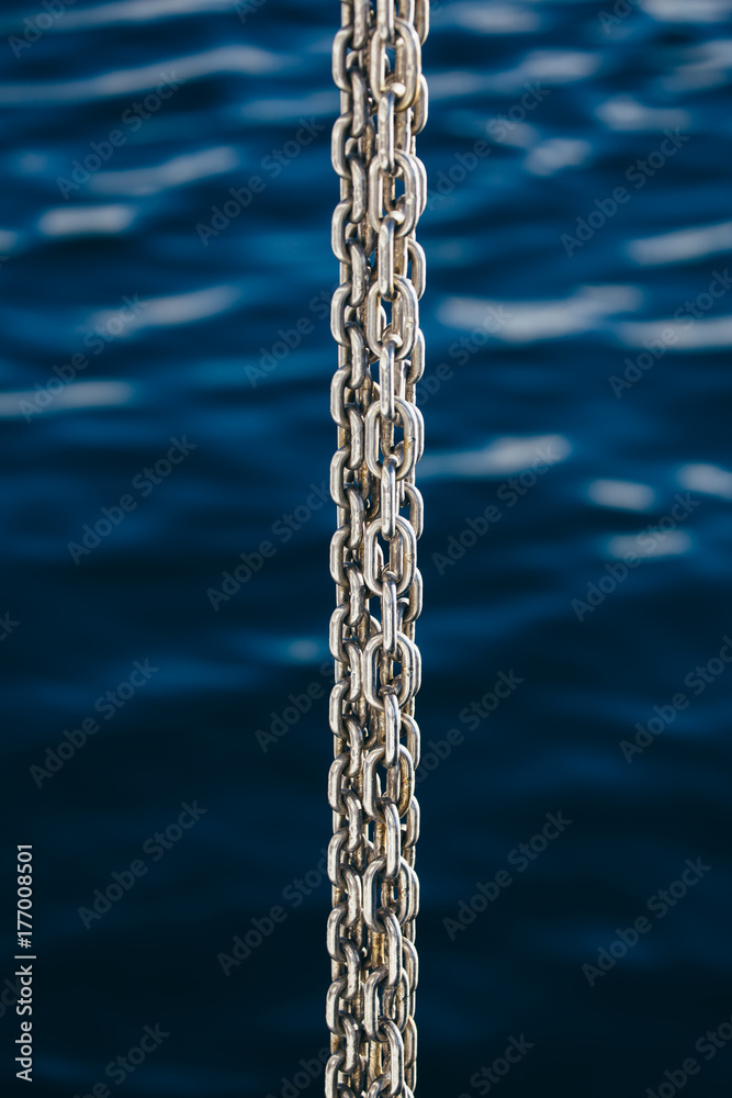 Large chain hanging from a boat Large chain hanging from a boat