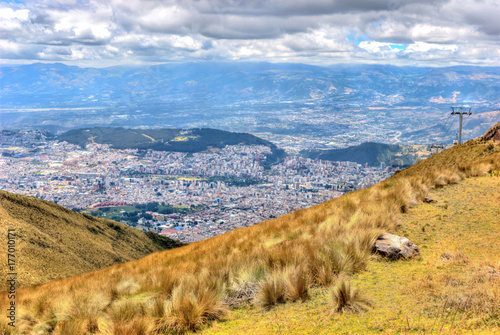 View of the city of Quito and the ecuadorian Andes from the Teleferico touristic attraction, at the top of the Pichincha volcano. Quito, Ecuador.