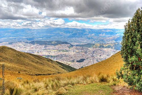 View of the city of Quito and the ecuadorian Andes from the Teleferico touristic attraction, at the top of the Pichincha volcano. Quito, Ecuador.