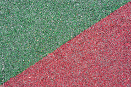 textured surface in red and green, diagonal pattern