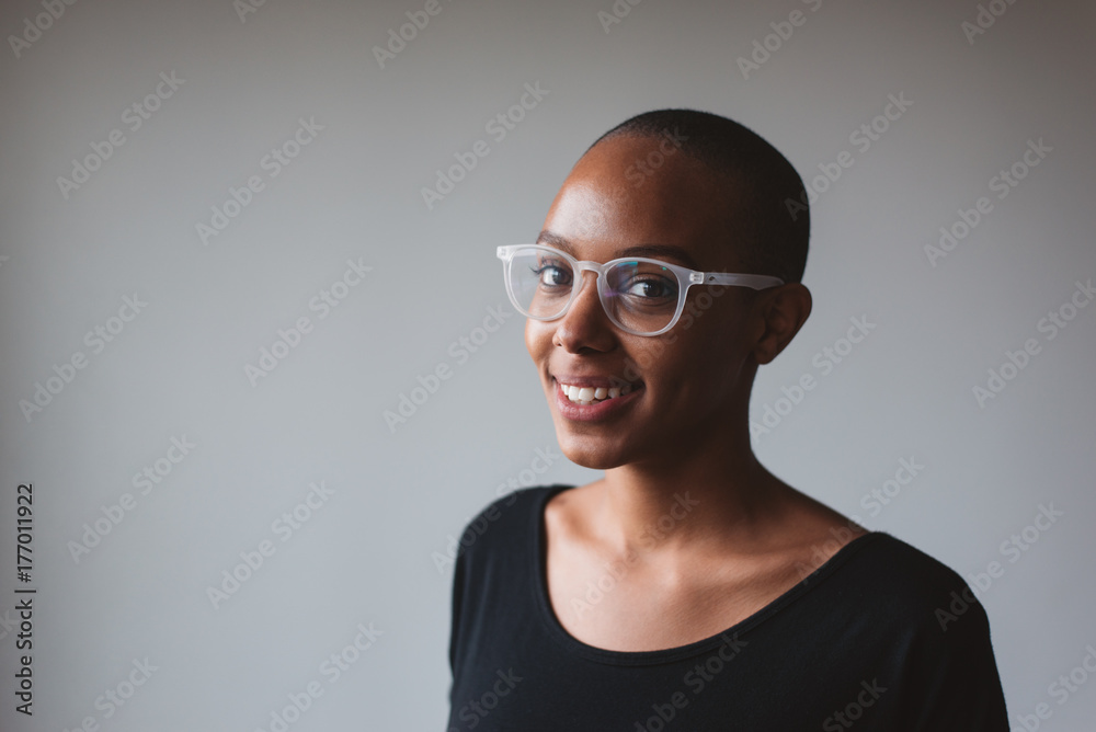 Cute African American Woman Smiling and Looking at Camera Cute African American Woman Smiling and Looking at Camera