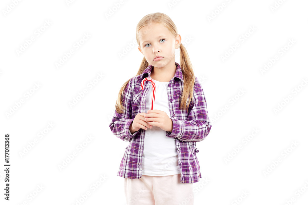 Portrait of cute little girl holding candy cane Portrait of cute little girl holding candy cane