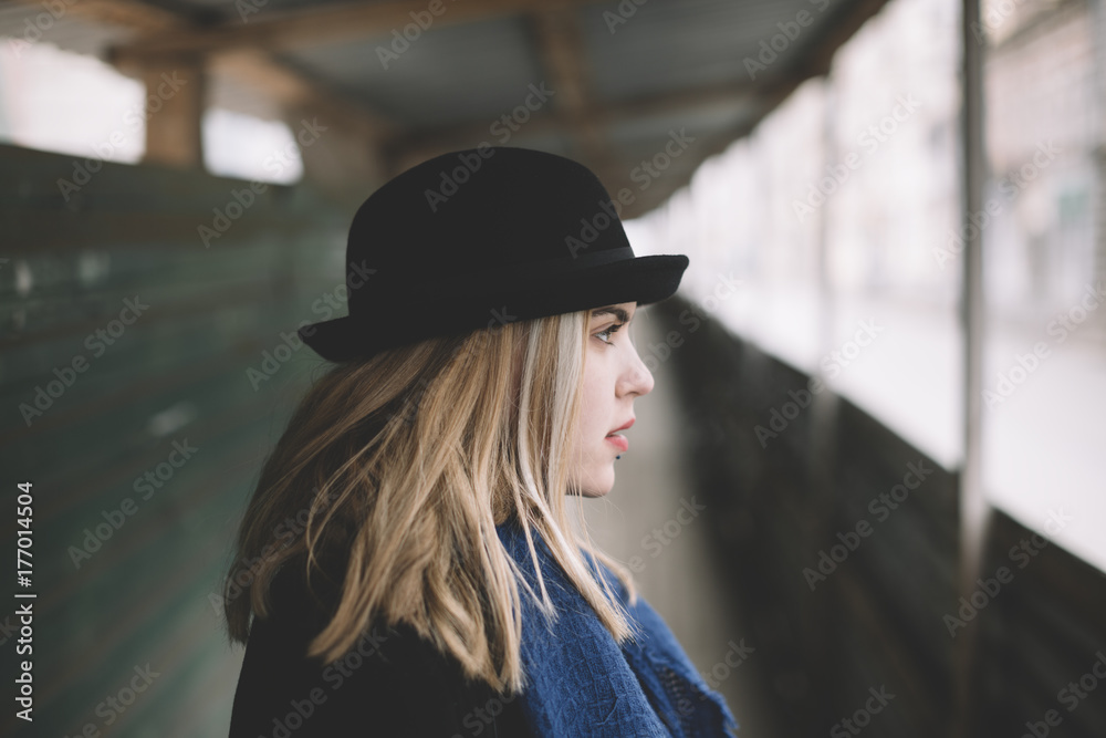 real young woman with black hat real young woman with black hat