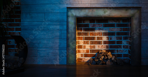 Tradional wood burning stove in a brick fireplace photo