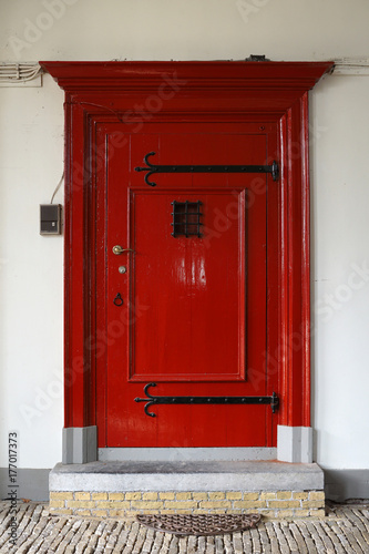 I see a red door and I want to paint it black