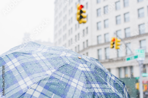 Umbrella covered with sleet and rain. New York City. photo