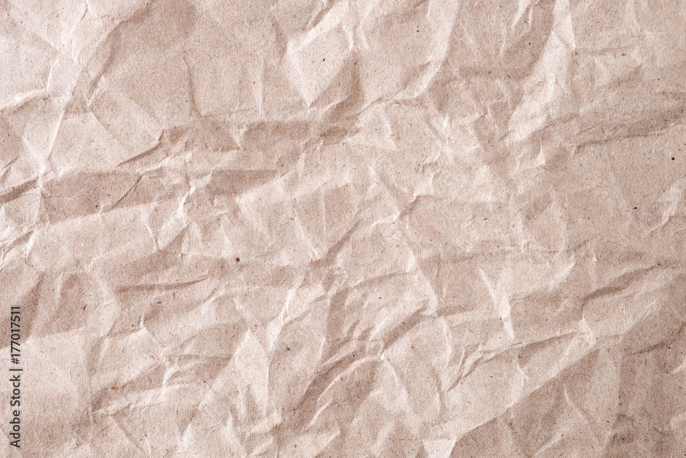 Fototapeta premium Crumpled Brown paper background texture