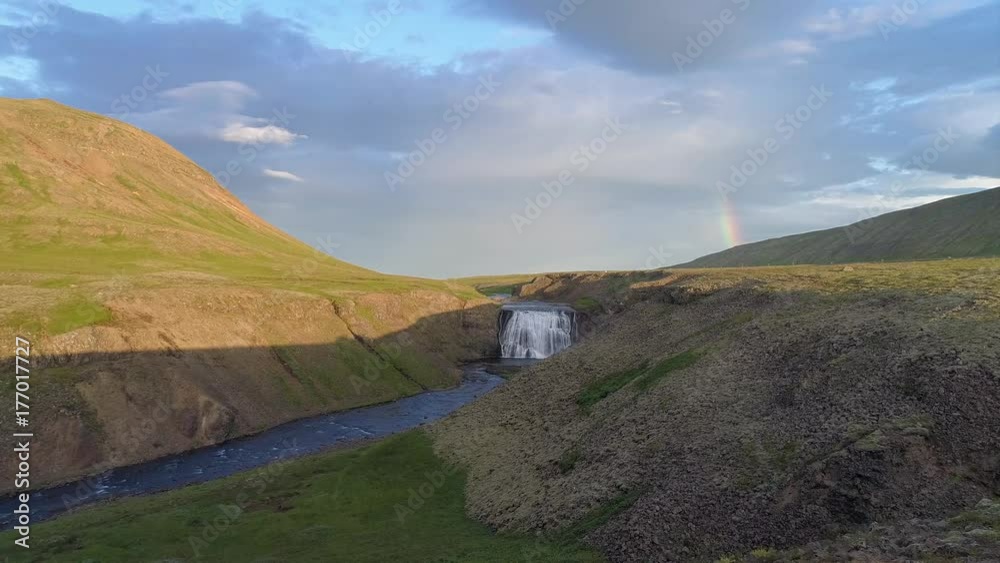 Aerial view of a waterfall in Iceland shot in summer Aerial view of a waterfall in Iceland shot in summer
