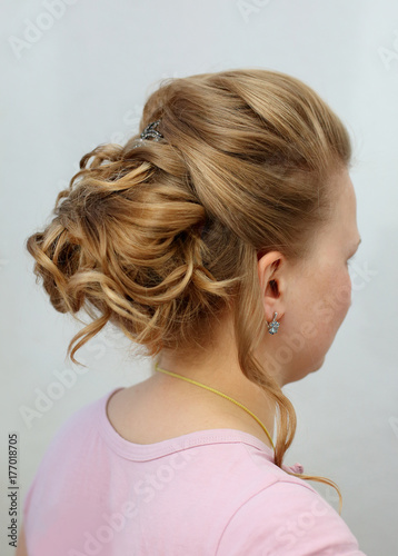 wedding hairstyle from curls and flowers