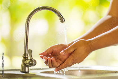 Close up Hand washing and cleaning photo