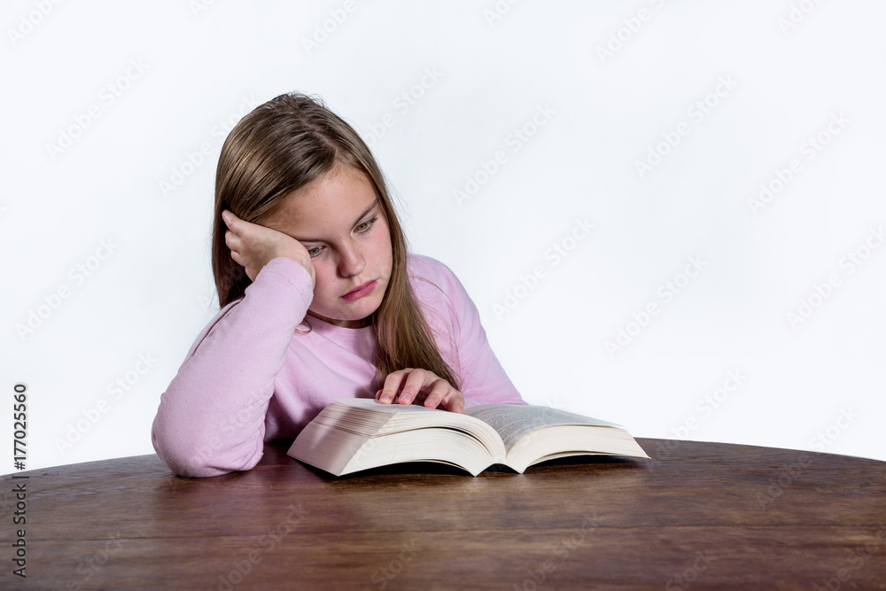 Bored girl with book on white background Bored girl with book on white background