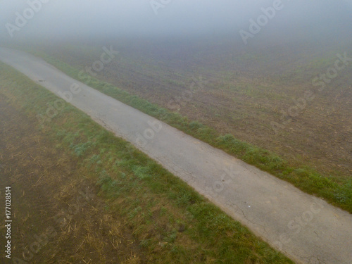 Aerial view of endless street in fog