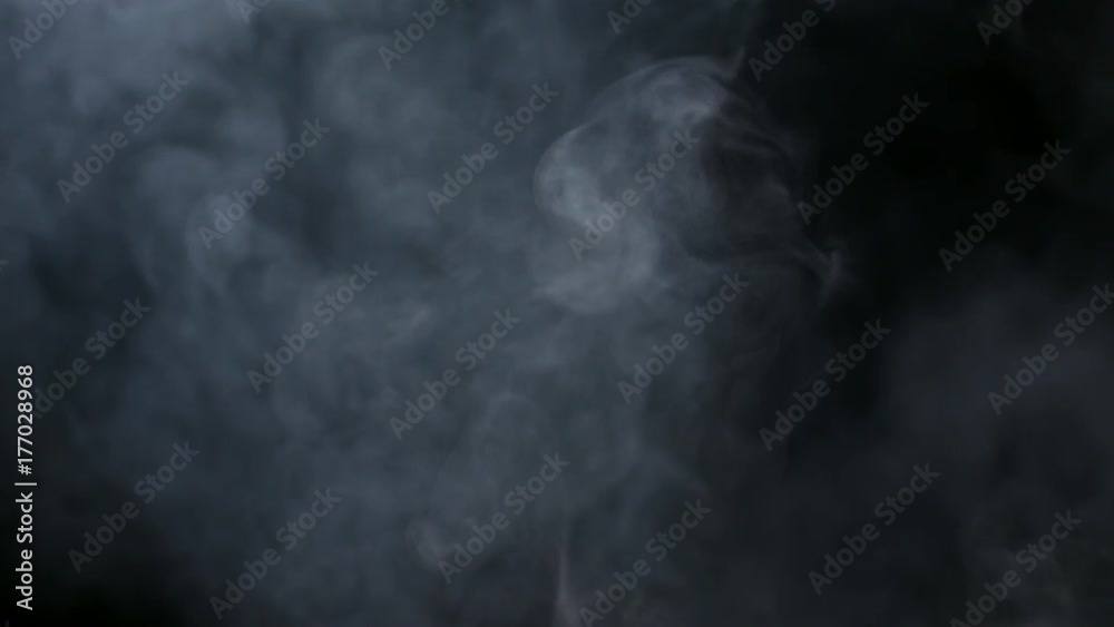 Smoky fog clouds over a black background. You can add this footage to your video project by dropping it in and changing its blending mode to Screen or Add Smoky fog clouds over a black background. You can add this footage to your video project by dropping it in and changing its blending mode to Screen or Add