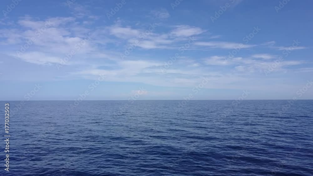 Beautiful Sea, Clouds and Blue Sky from a drone (aerial view)
Beautiful Sea, Clouds and Blue Sky from a drone (aerial view)