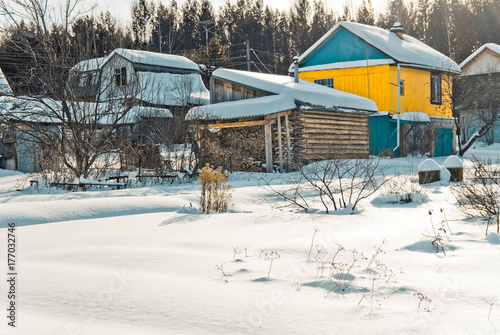 Obraz na płótnie Garden village in a winter - country small settlement, The Urals, Russia w salonie