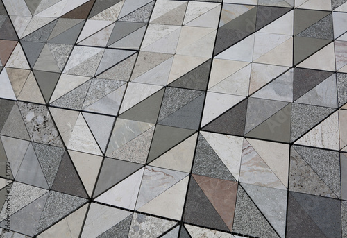 stone floor with triangular shape each made with a different typ