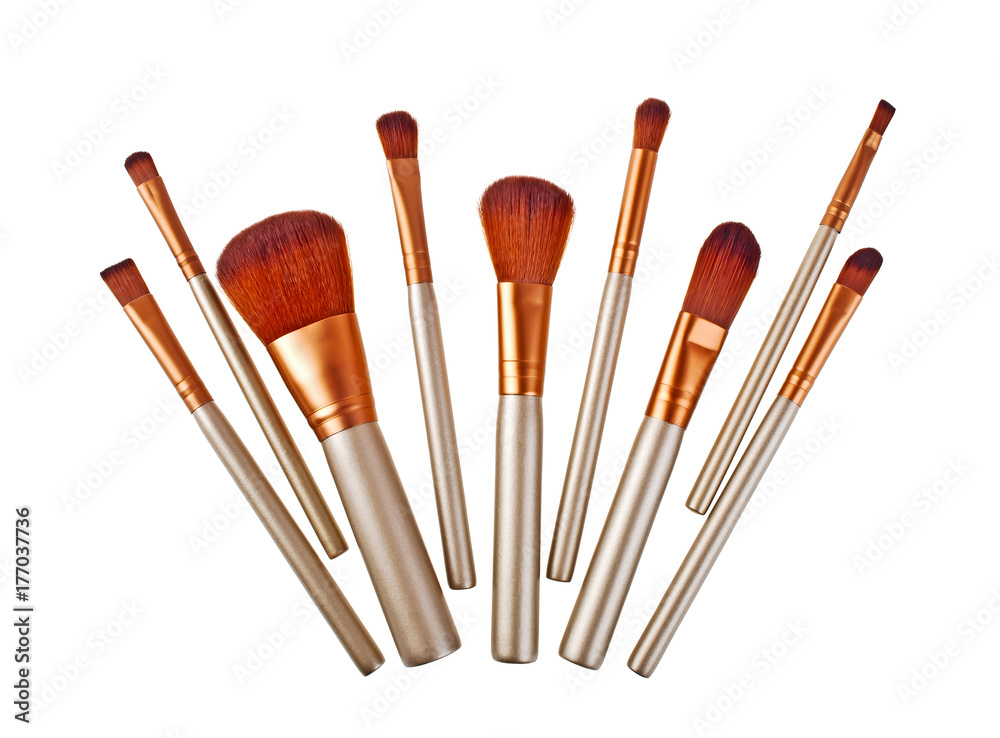 brown make-up brushes isolated on a white background brown make-up brushes isolated on a white background