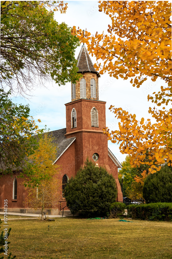 A Picturesque Church Framed in Fall Color A Picturesque Church Framed in Fall Color