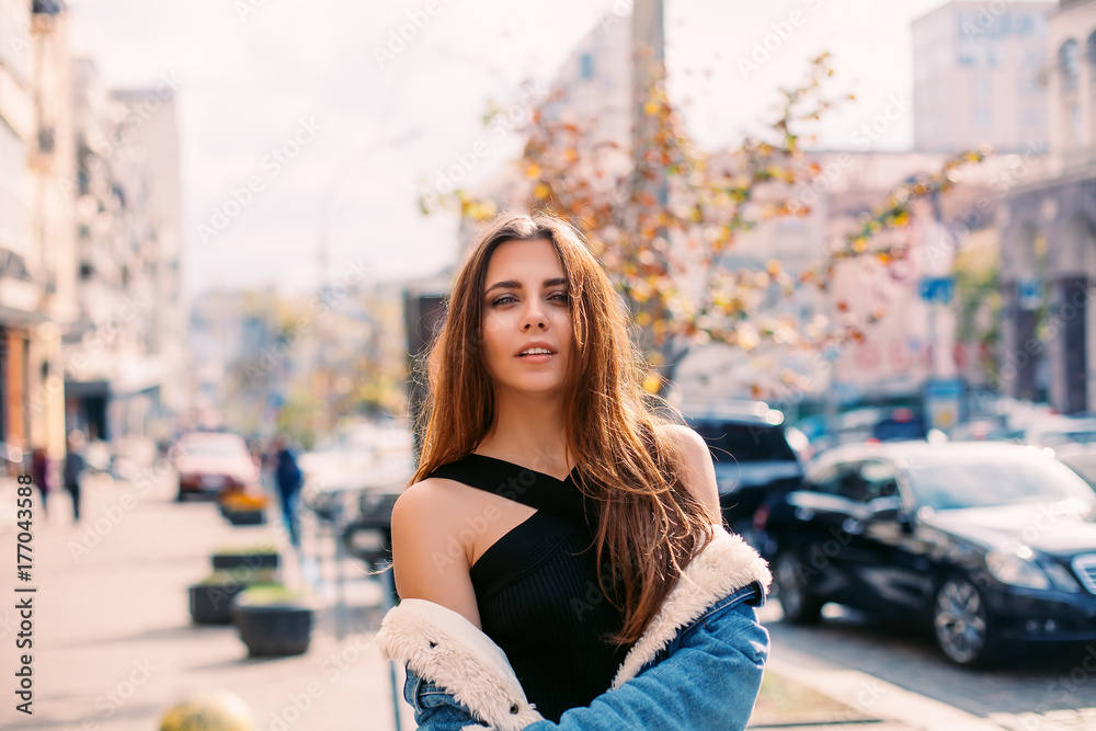 Fashion hipster woman posing outdoor 