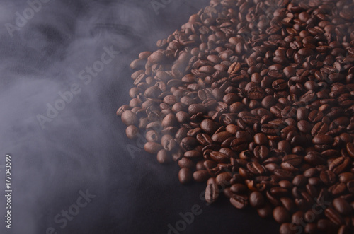 Brazilian hot coffee seeds background with smoke for coffee shops.