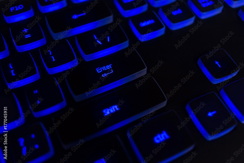 black keyboard with blew lightning, dark image, shallow depth of field black keyboard with blew lightning, dark image, shallow depth of field