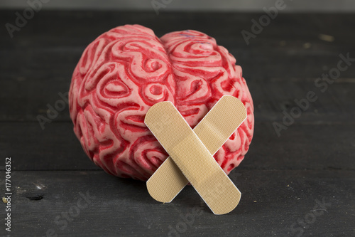 Plaster and Brain Mental Health Concept photo