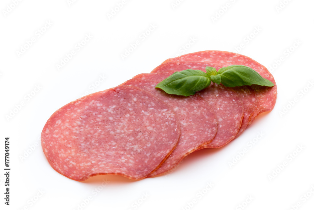 Salami slices isolated on white background. Salami slices isolated on white background.