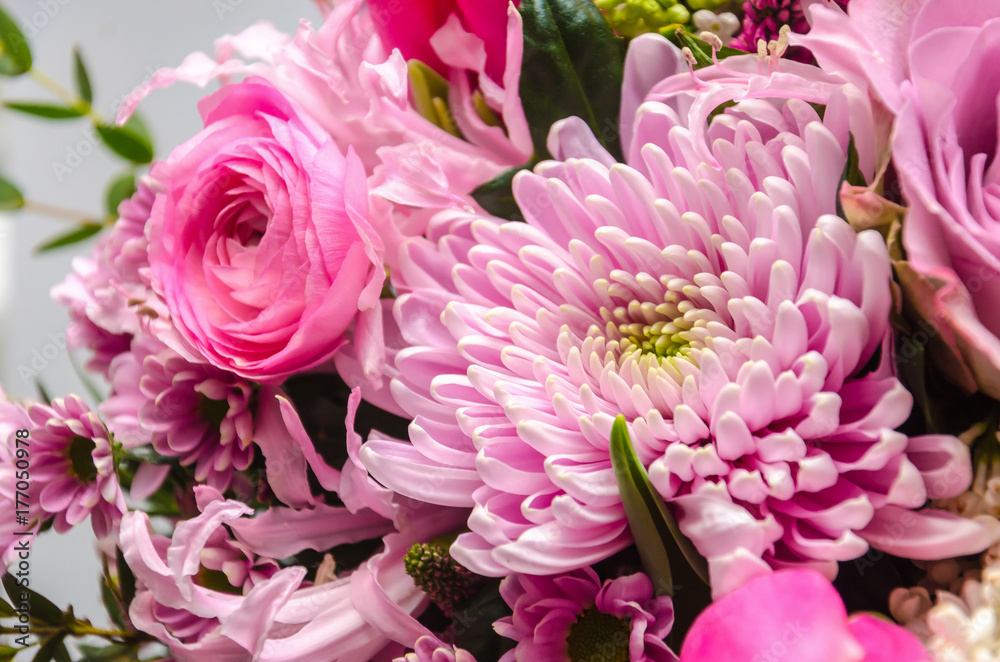 delicate fresh bouquet of fresh flowers with a pink aster. delicate fresh bouquet of fresh flowers with a pink aster.