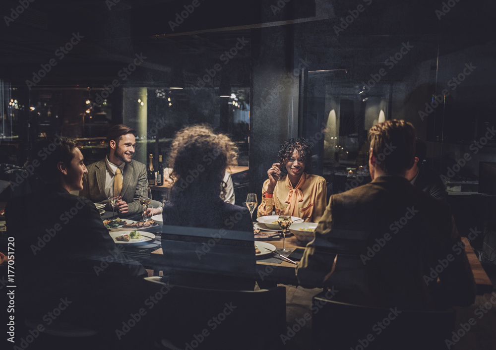 Group of People at a Dinner Party Group of People at a Dinner Party