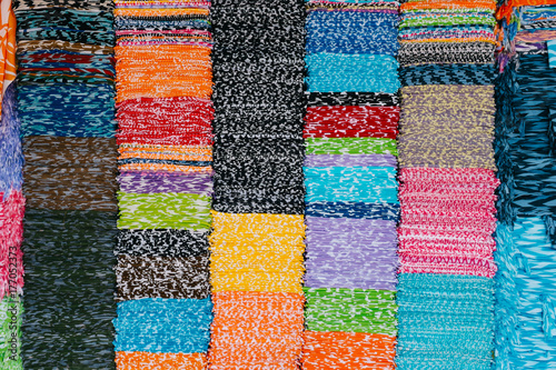 Stacks of Colourful Fabric in Wholesale Store in Bali