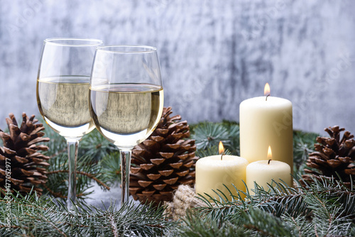 New Year card  design with two glass-wine, candles and christmas tree