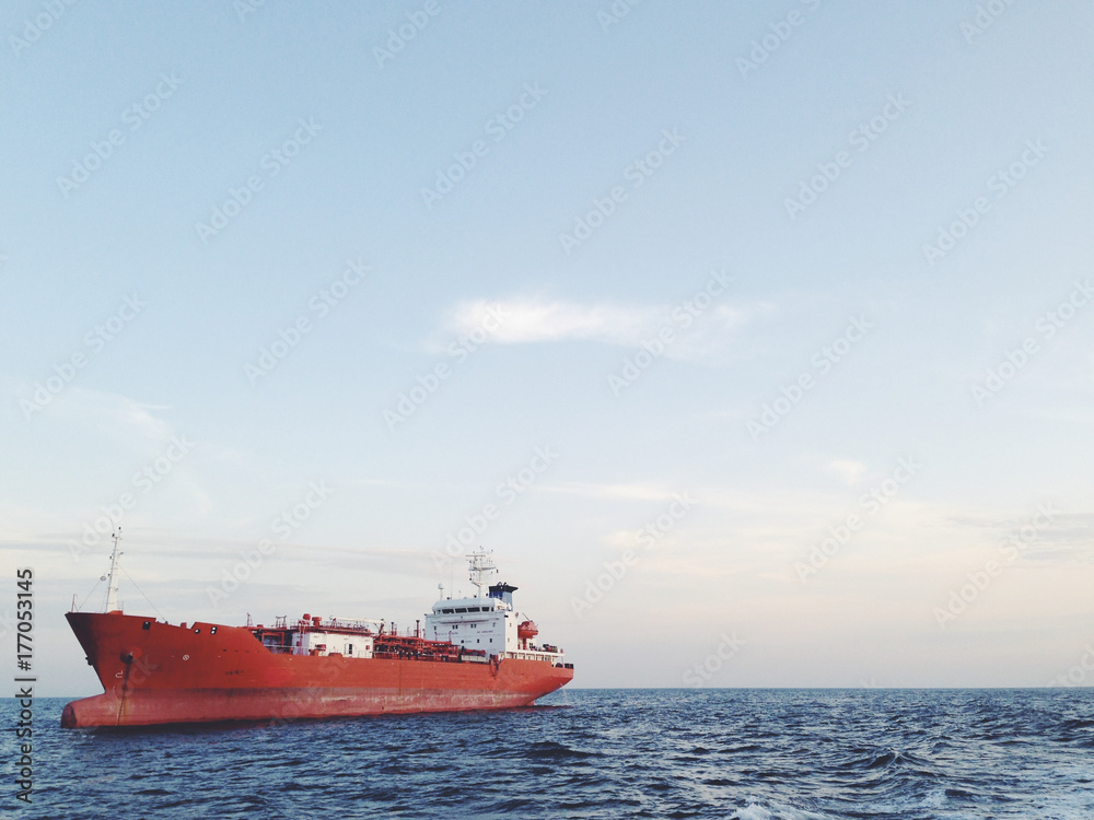 Empty cargo ship on the water Empty cargo ship on the water