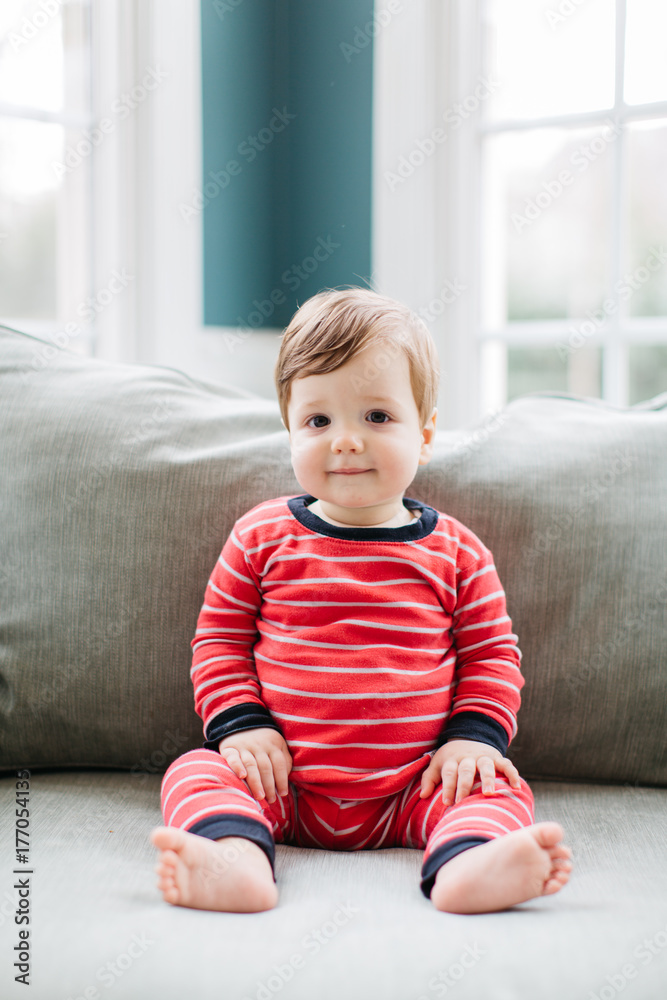 Cute toddler sitting in an oversized chair Cute toddler sitting in an oversized chair