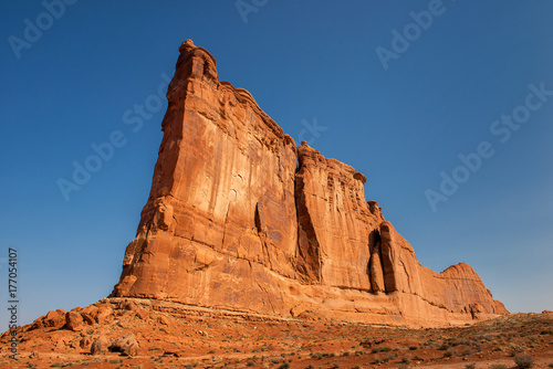 Arches National Park: The Tower of Babel (majestic sandstone formation with copy space on blue sky)