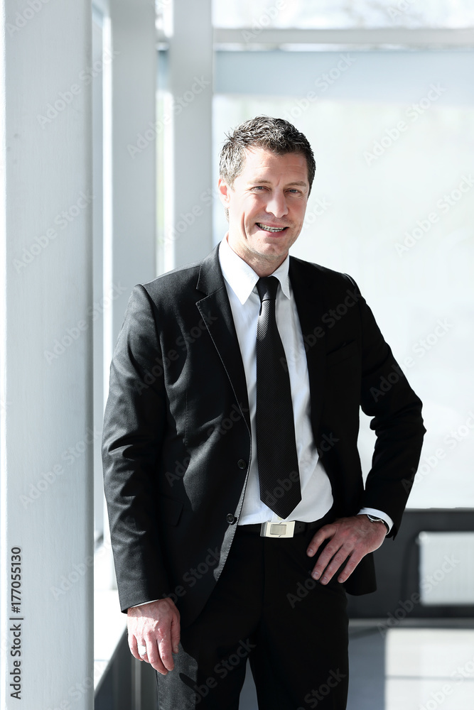 portrait of confident businessman on blurred background portrait of confident businessman on blurred background