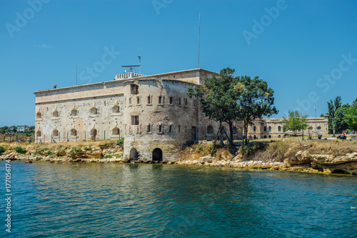 Old damaged by war fort in the Black Sea coast. Coastal Michael's fortress in Sevastopol, Crimea 