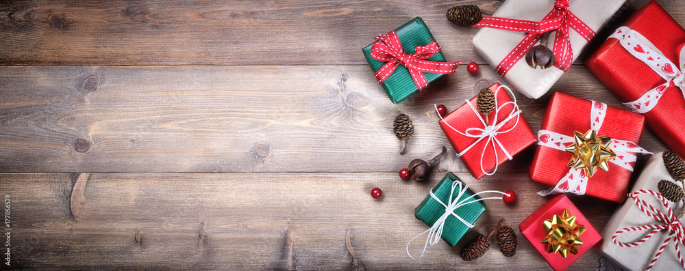 Christmas gifts on wood background