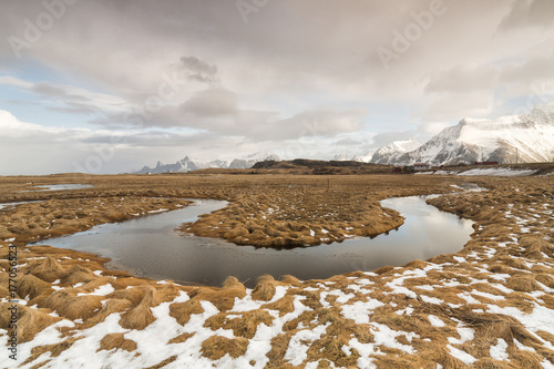 Grassy plateau full of meandering channels photo