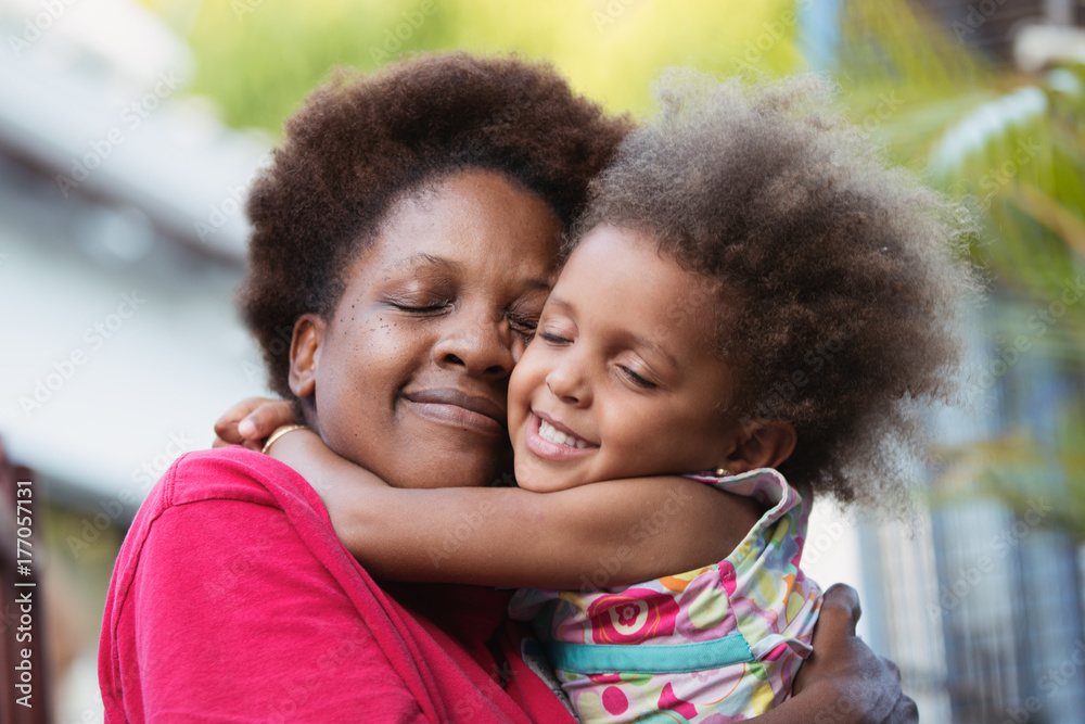 Portrait of mother and child hugging sweetly Portrait of mother and child hugging sweetly