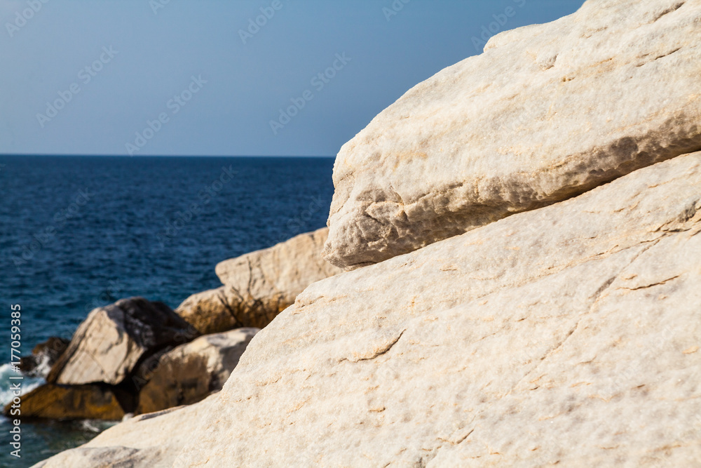 Aegean seashore and marble rocks in Aliki, Thassos island, Greece
