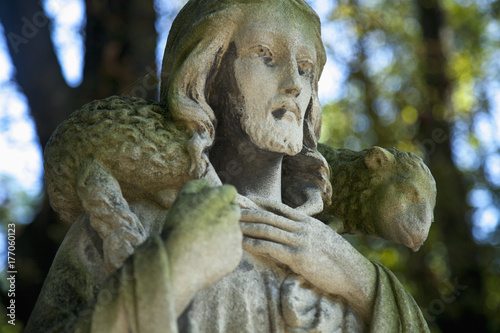 Fototapeta Naklejka Na Ścianę i Meble -  Jesus Christ - the Good Shepherd (ancient statue, close up)