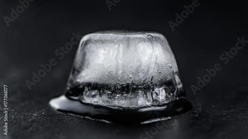 Melting ice cubes in 4K UHD (close-up; timelapse footage)