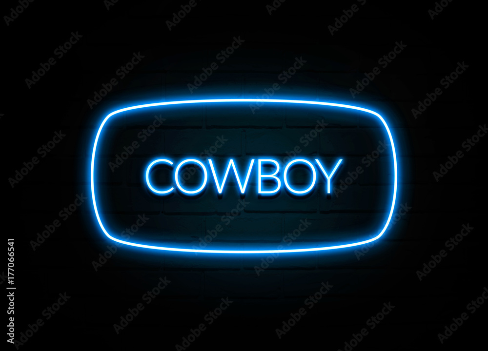 Cowboy - colorful Neon Sign on brickwall Cowboy - colorful Neon Sign on brickwall