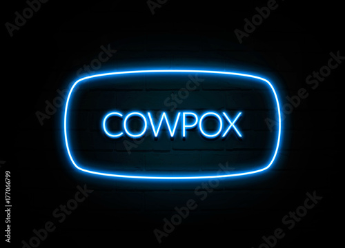 Cowpox  - colorful Neon Sign on brickwall photo