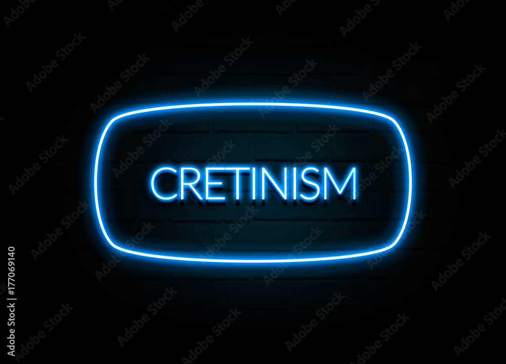 Cretinism  - colorful Neon Sign on brickwall