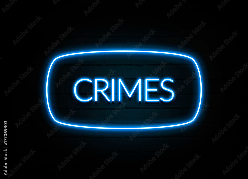 Crimes - colorful Neon Sign on brickwall Crimes - colorful Neon Sign on brickwall