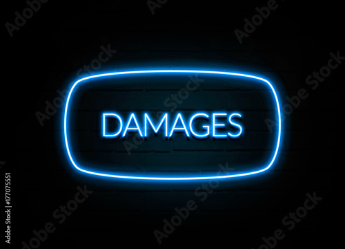 Damages - colorful Neon Sign on brickwall