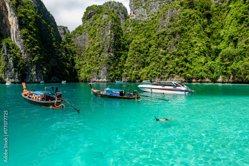 Tourist enjoy beautiful crystal clear water at Pileh bay at Phi Phi island near Phuket, Thailand