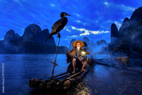 Fisherman of Guilin, Li River and Karst mountains, Guangxi, China