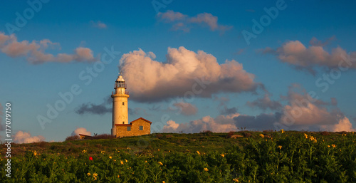 Landscape: Lighthouse at sunset.